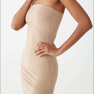 Nude bodycon dress.